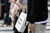 Mobile Phone Users And Stores As NTT DoCoMo Inc. Leads Plunge After Abe Calls For Lower Phone Bills