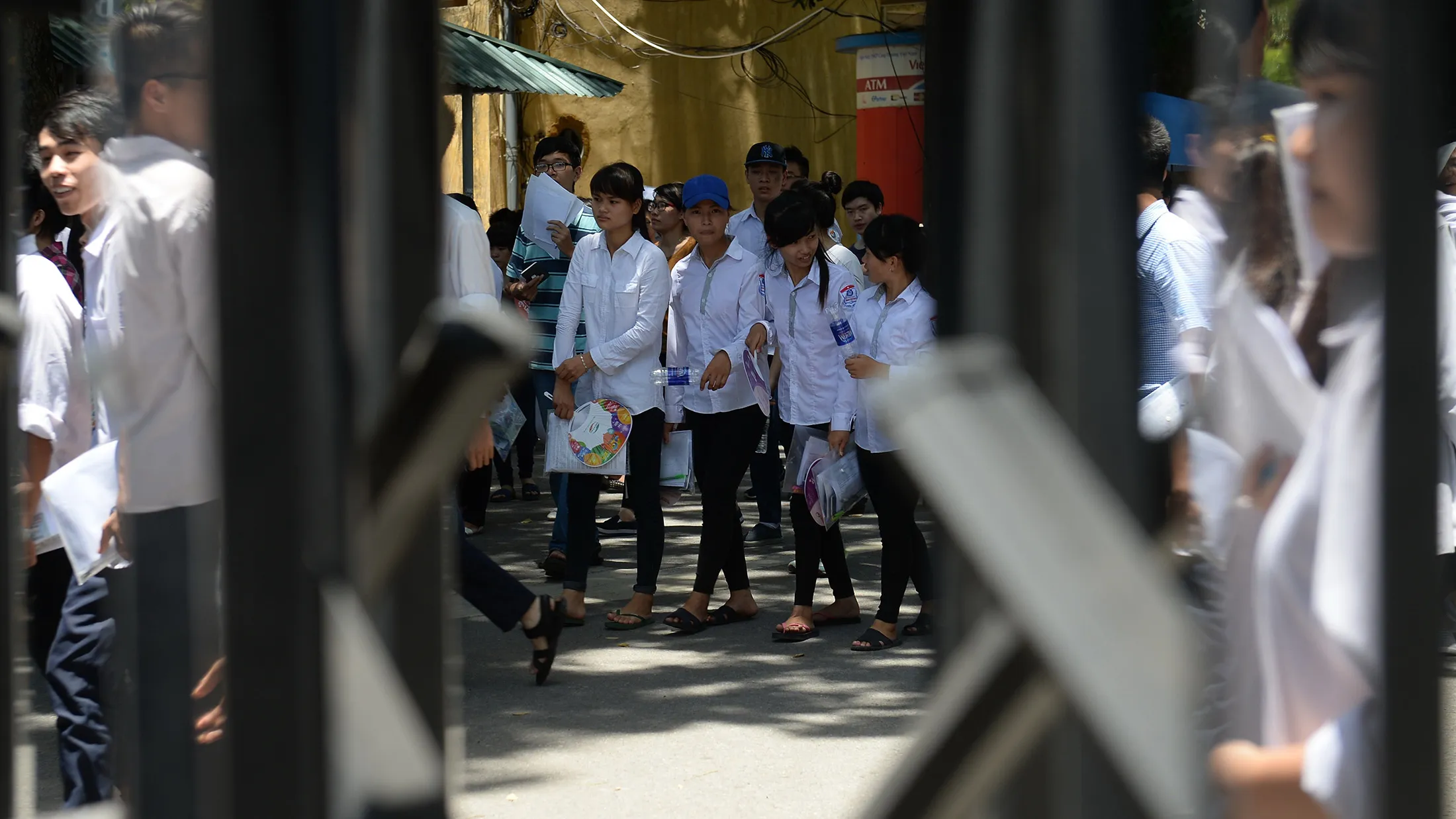 Students leave after attending the first day of a national college entrance examination at Hanoi University of Science and Technology in Hanoi on July 1, 2015. More than one million high school students throughout the country attend the four-day-long exam starting on July 1. AFP PHOTO / HOANG DINH Nam (Photo credit should read HOANG DINH NAM/AFP/Getty Images)
