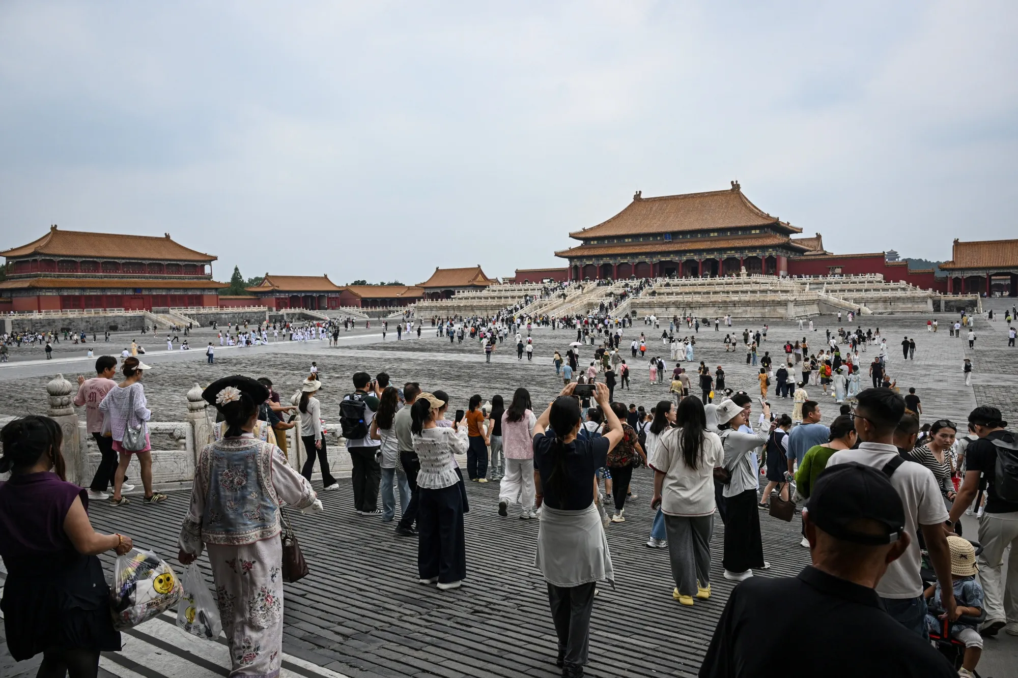 People visit the Forbidden City in Beijing.