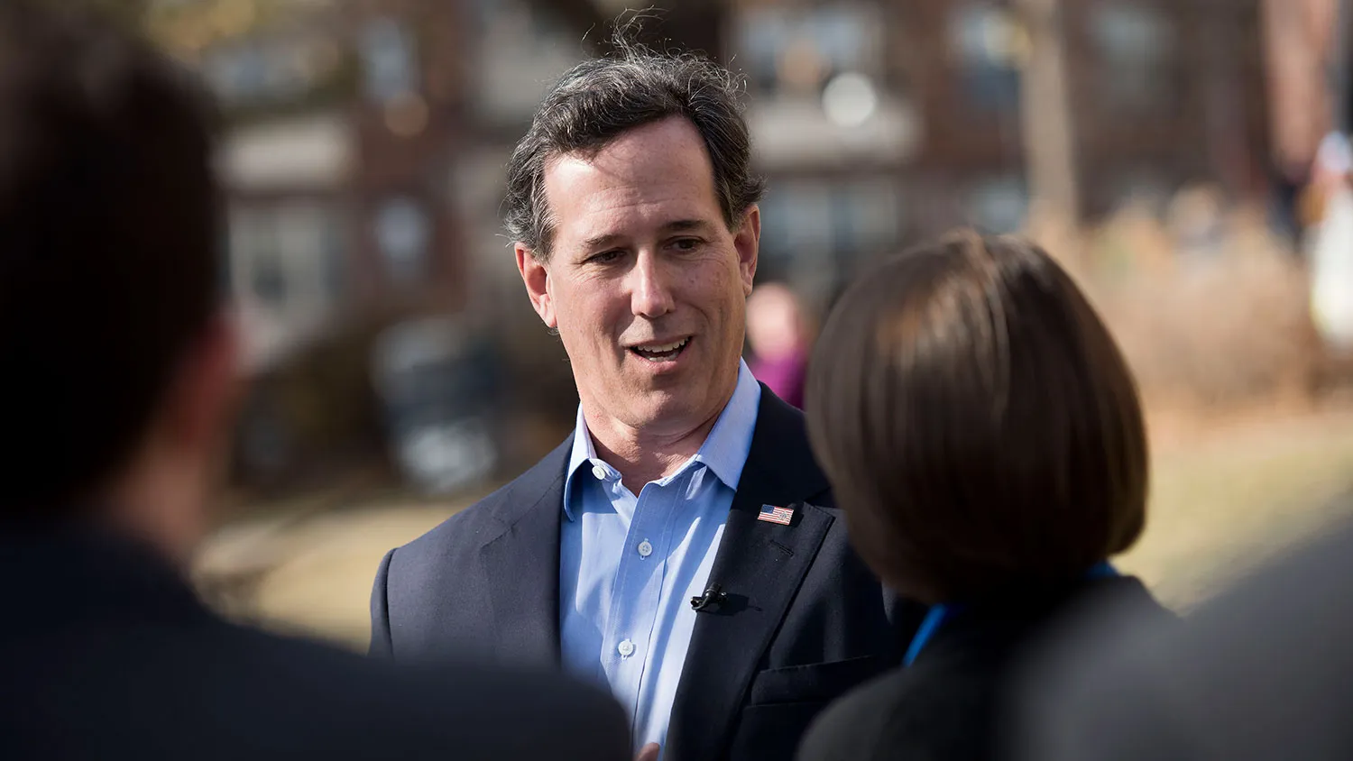 Rick Santorum, former senator of Pennsylvania, speaks during a television interview outside the Iowa Freedom Summit in Des Moines, Iowa, U.S., on Saturday, Jan. 24, 2015.

