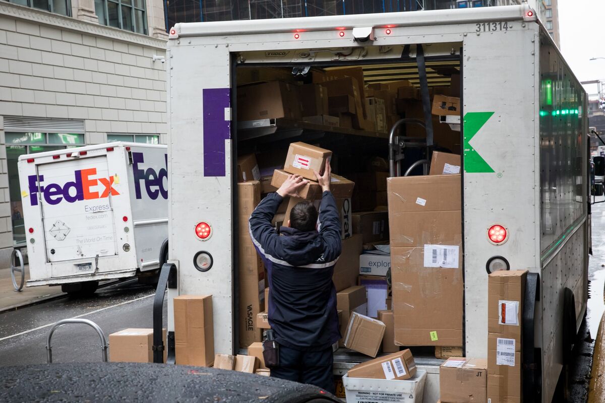 FedEx (FDX) Jumps After Boosting Forecast as Cost Cuts Take Hold - Bloomberg