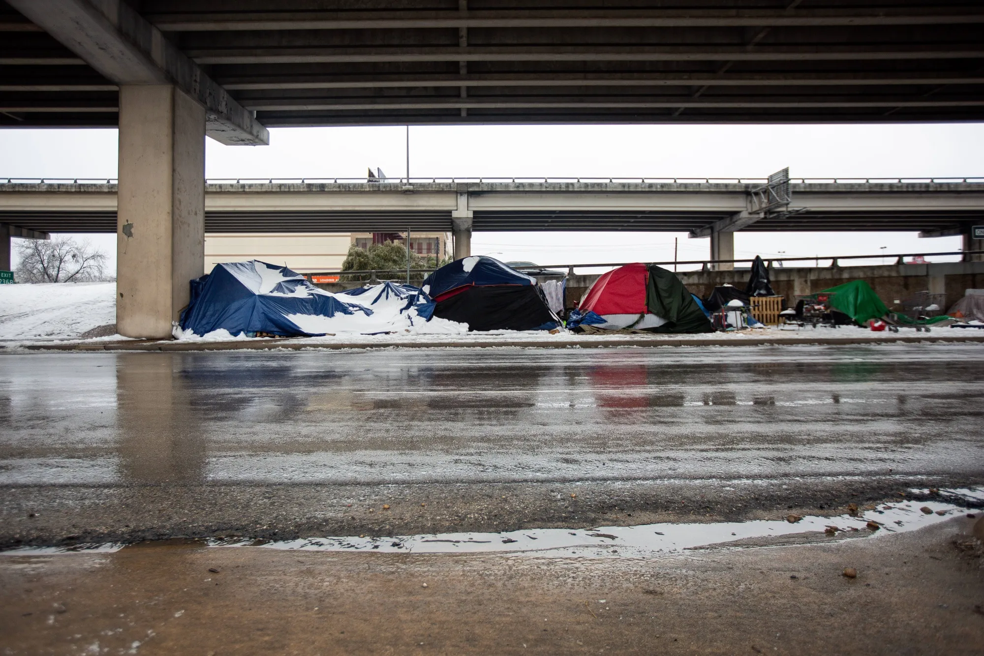 Homeless encampments sit along the I-35 frontage road in Austin, Texas on Feb.&nbsp;17.&nbsp;