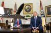 U.S. President Donald Trump, right, speaks while Justin Trudeau, Canada's prime minister, listens in the Oval Office of the White House.