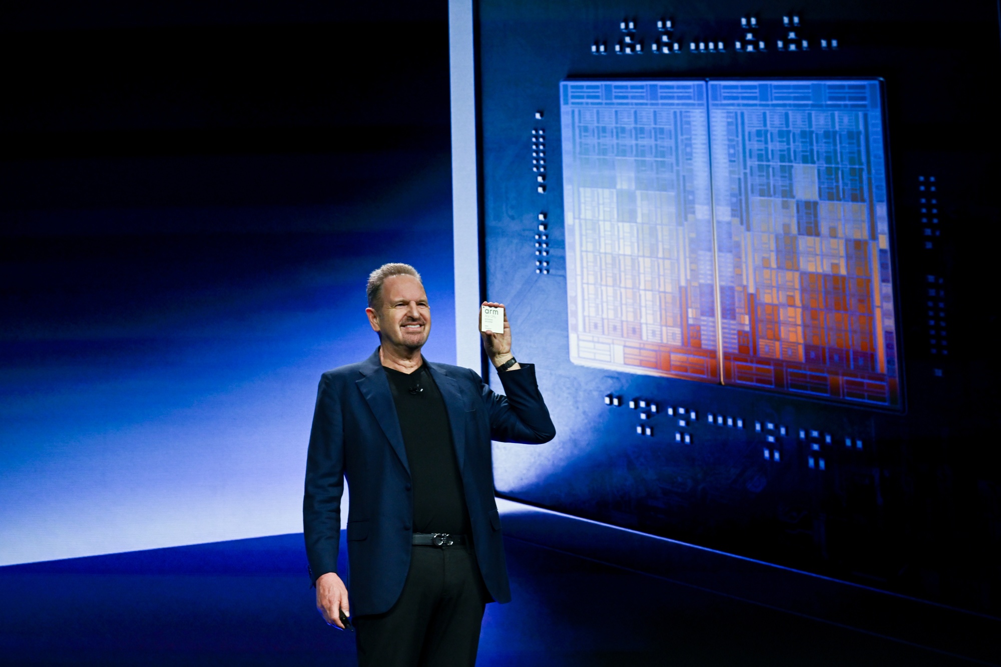 Arm Holdings Plc CEO Rene Haas holds the AGI CPU chip during the Arm Everywhere event in San Francisco on March 24.
