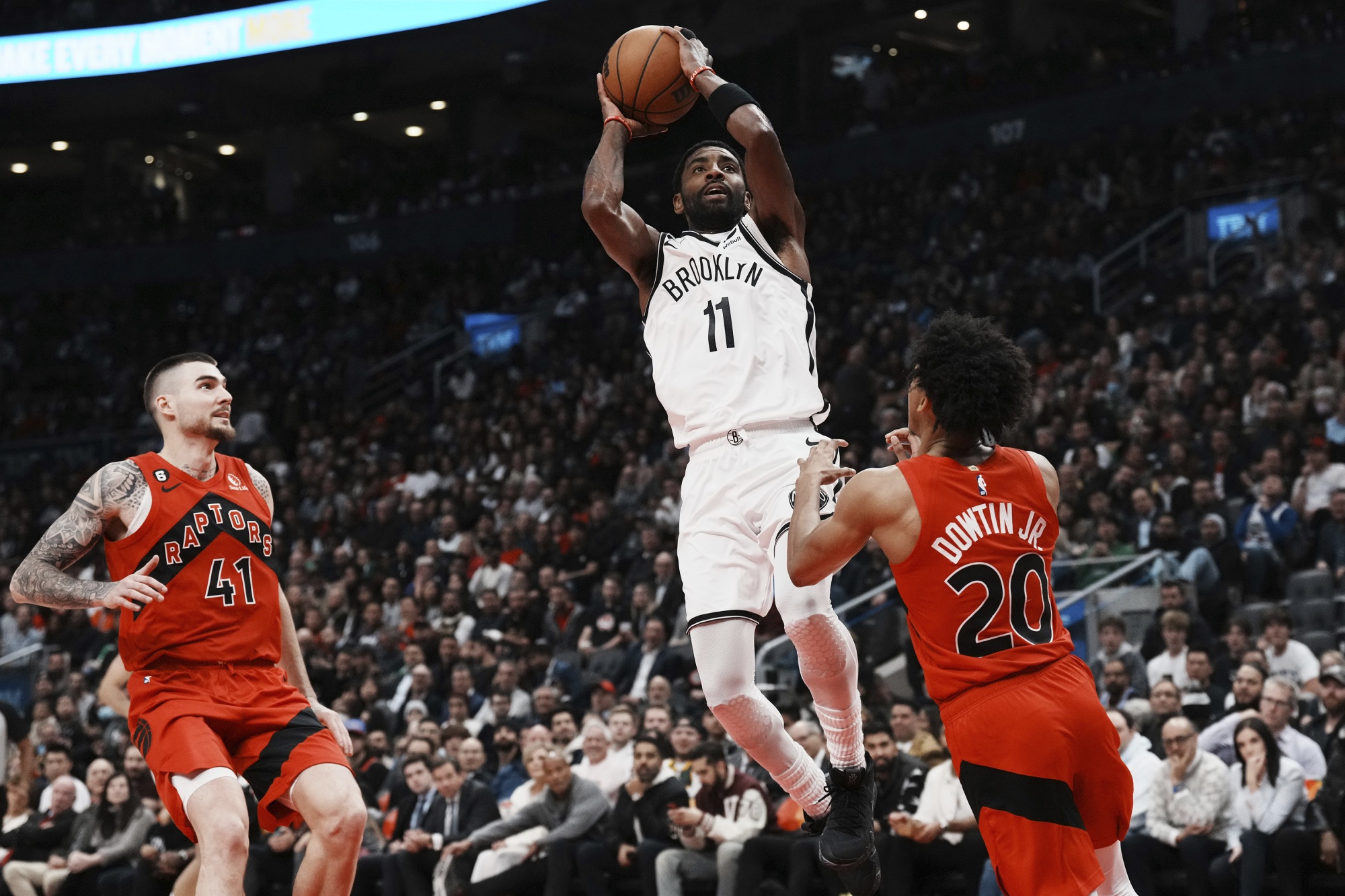 Irving Scores 29, Nets Beat Depleted Raptors 112-98 - Bloomberg