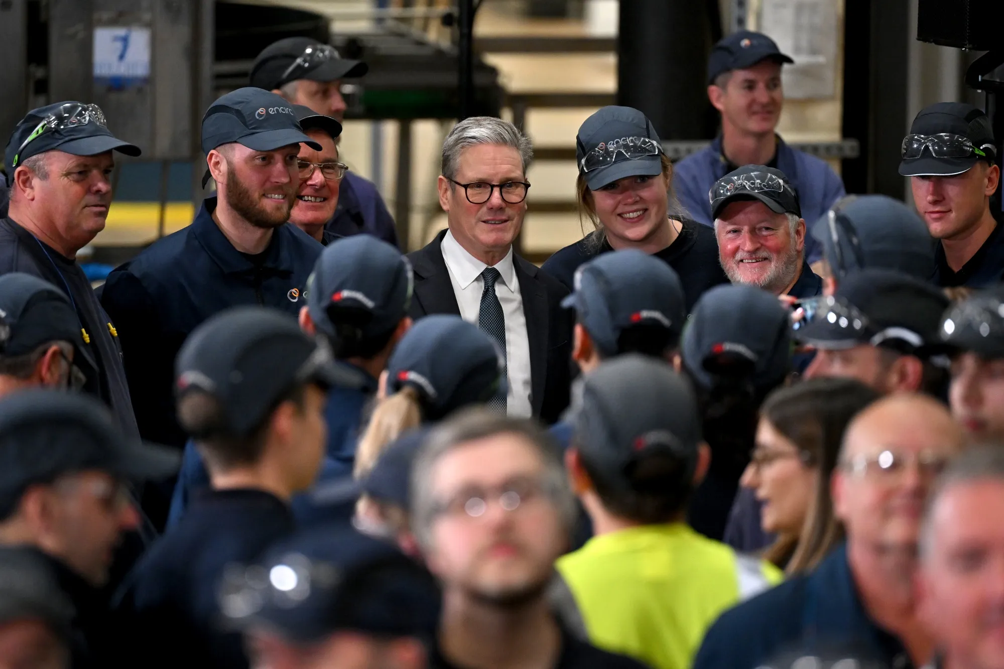 Keir Starmer, UK prime minister, meets workers during a visit to the Encirc Glass factory in Chester, UK.