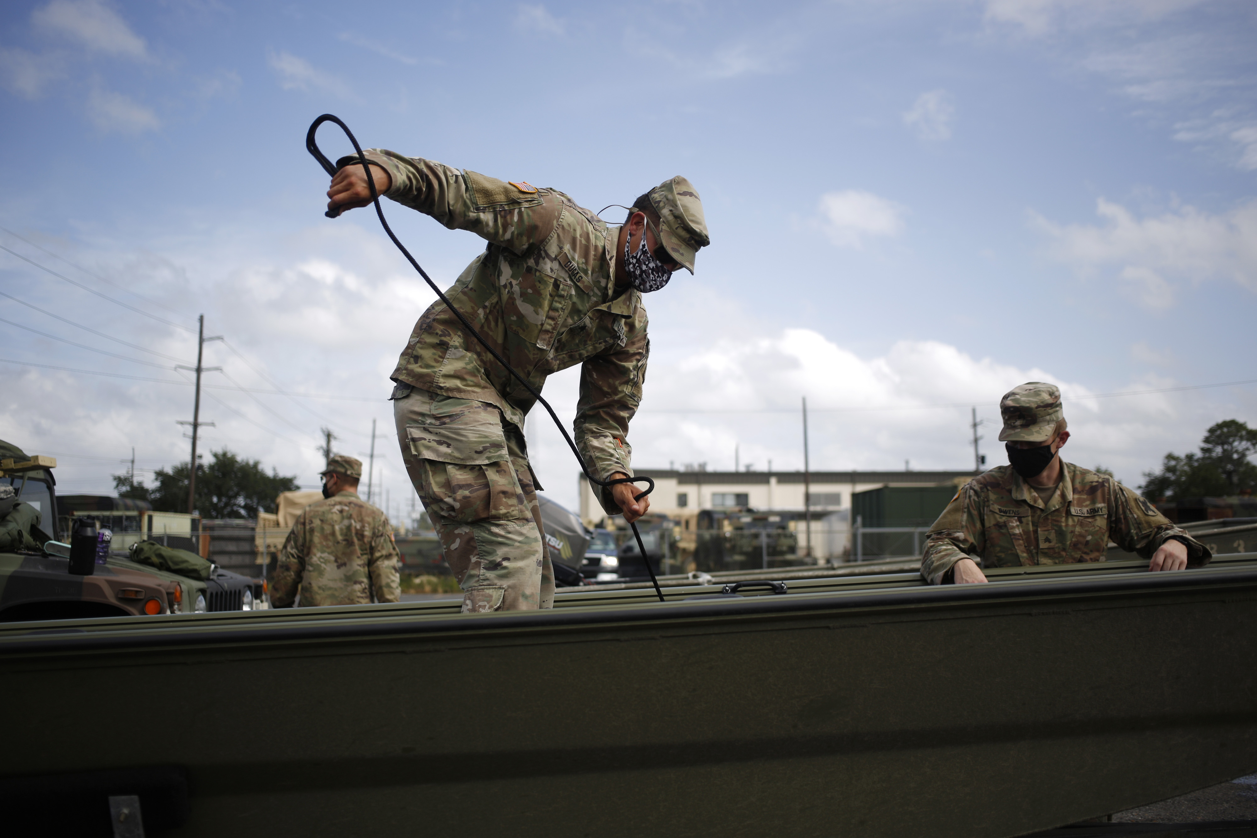 Louisiana Army National Guard soldiers prepare equipment ahead of Hurricane Laura in Lake Charles, Louisiana, U.S., on&nbsp;Aug. 26.