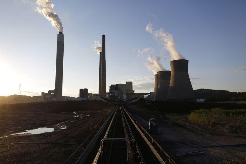 Coal that will be burned to generate electricity moves down a conveyor belt at a coal-fired power plant in Winfield, West Virginia.