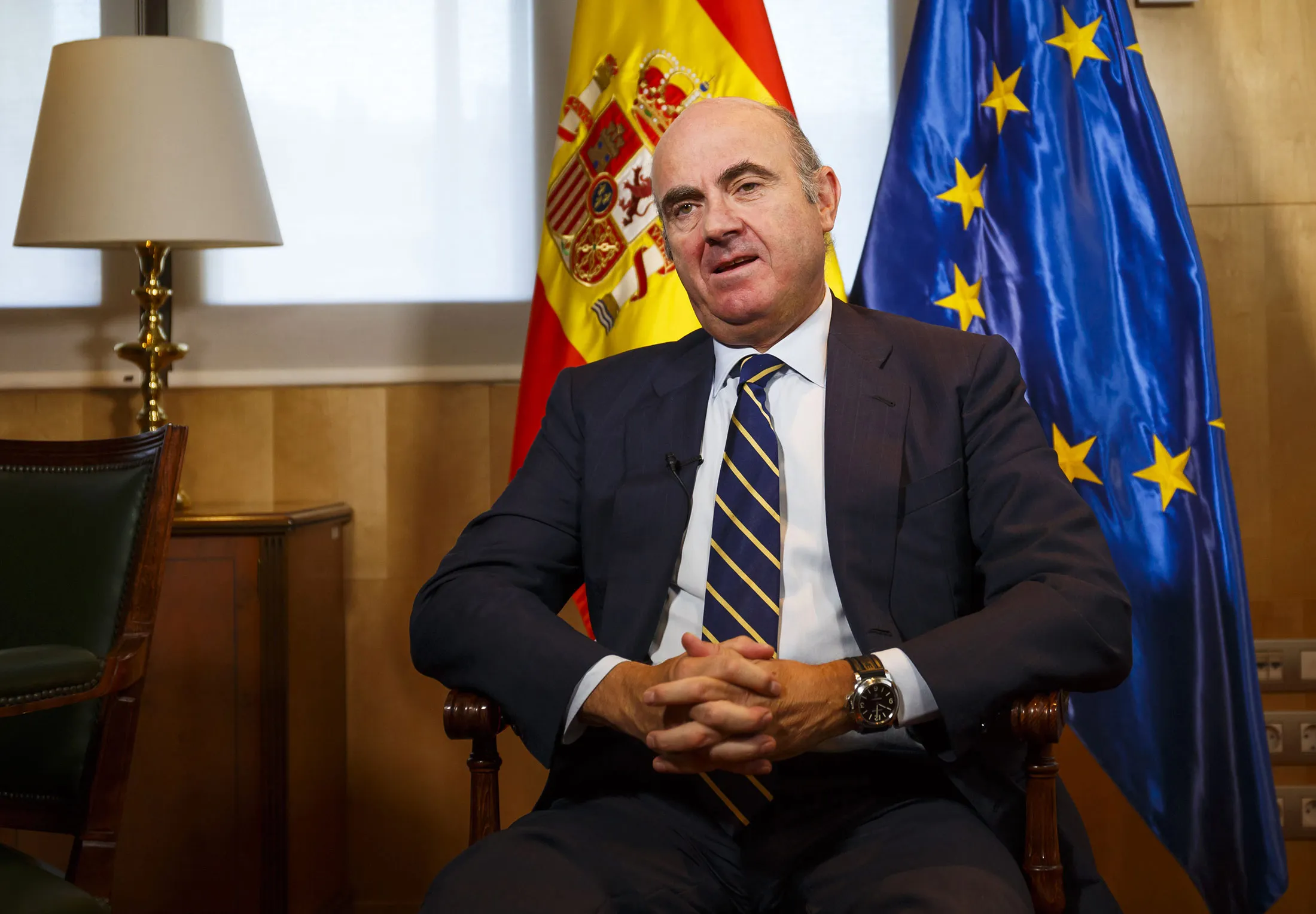 Spanish Economy Minister, Luis de Guindos, gestures during a tv interview Madrid , Spain, on Thrusday, Oct. 5, 2017.