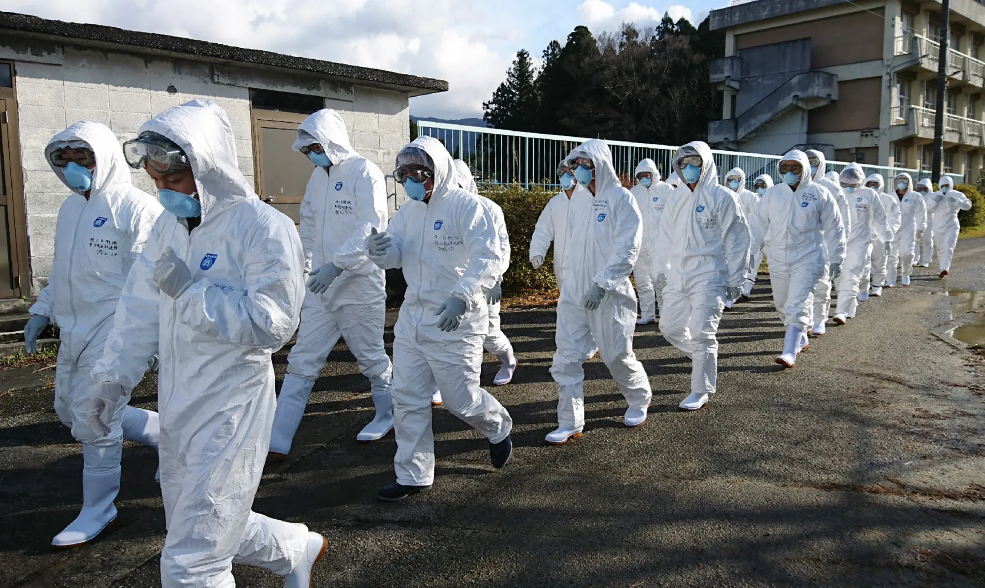 Japanese self-defense forces on the front lines against an outbreak.
