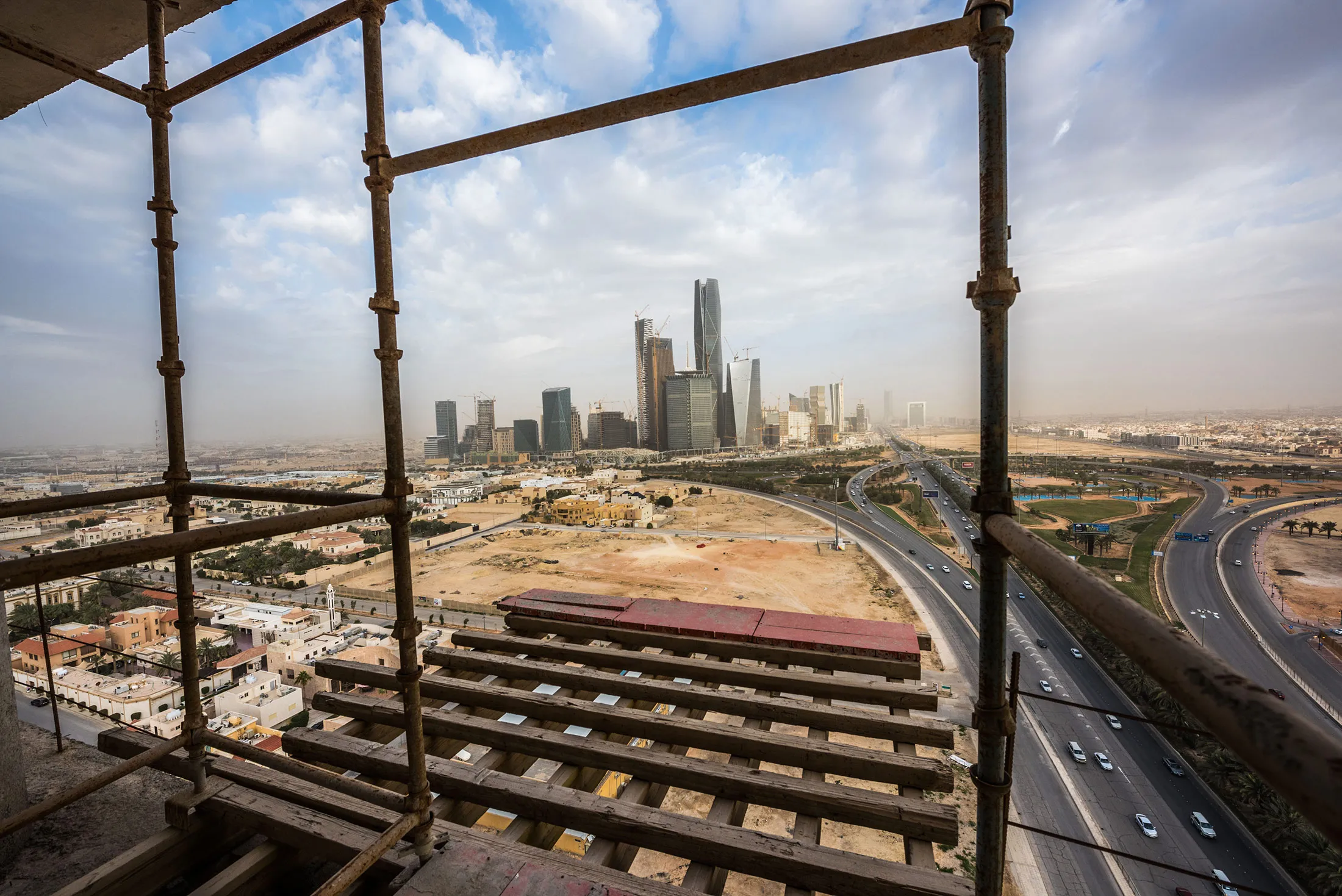 The King Abdullah financial district sits on the horizon in Riyadh.

