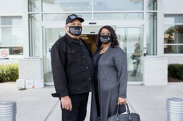 Pictured: Michael and Phyllis Addison leave the LifeBridge Health vaccine clinic in Randallstown, Maryland after receiving their Covid-19 vaccine on March 23.
