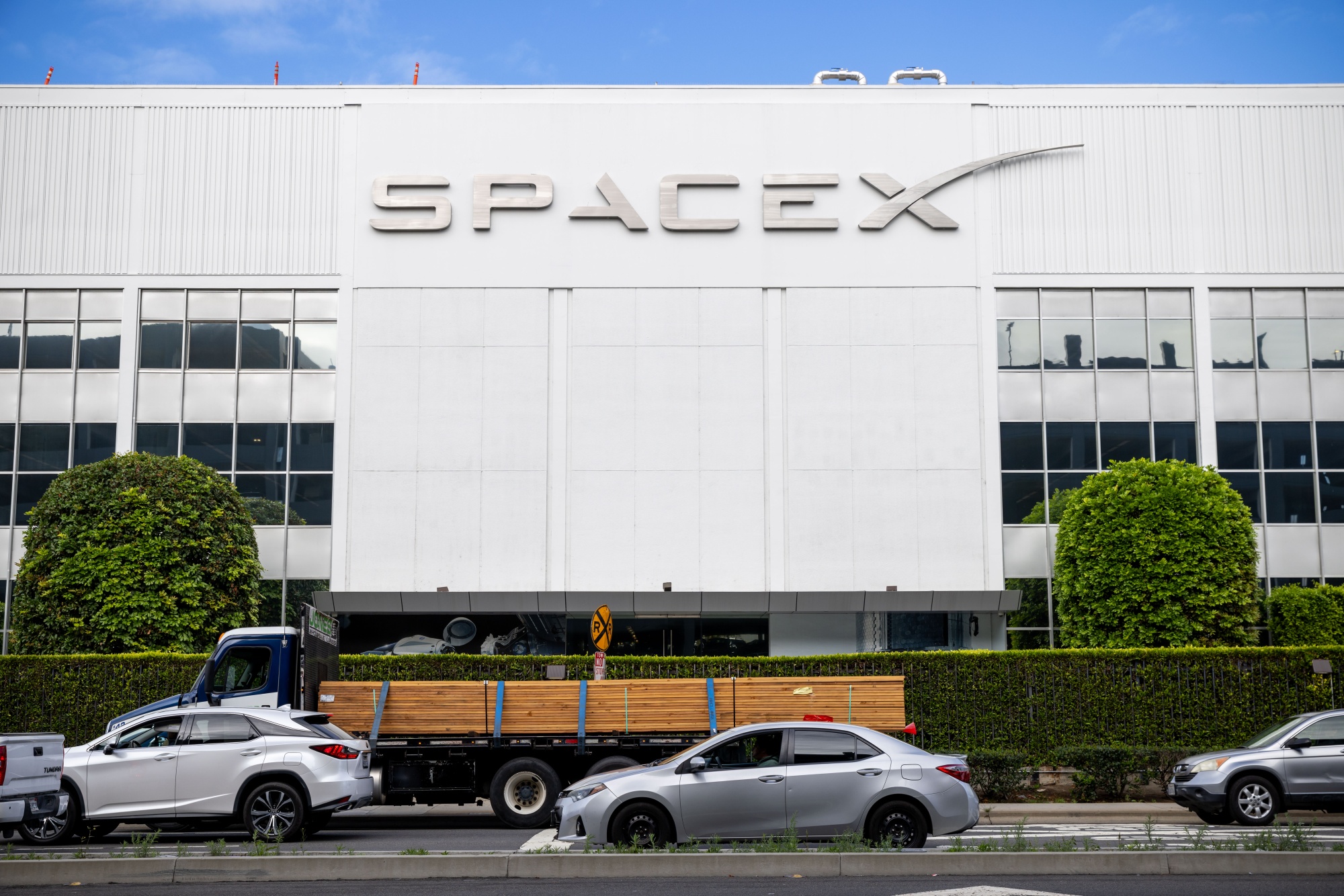 SpaceX facilities in Hawthorne, California, US, on Monday, April 13, 2026. SpaceX has filed confidentially for an initial public offering, according to people familiar with the matter, bringing billionaire Elon Musk's rocket, satellite and AI company closer to delivering the biggest-ever listing.
