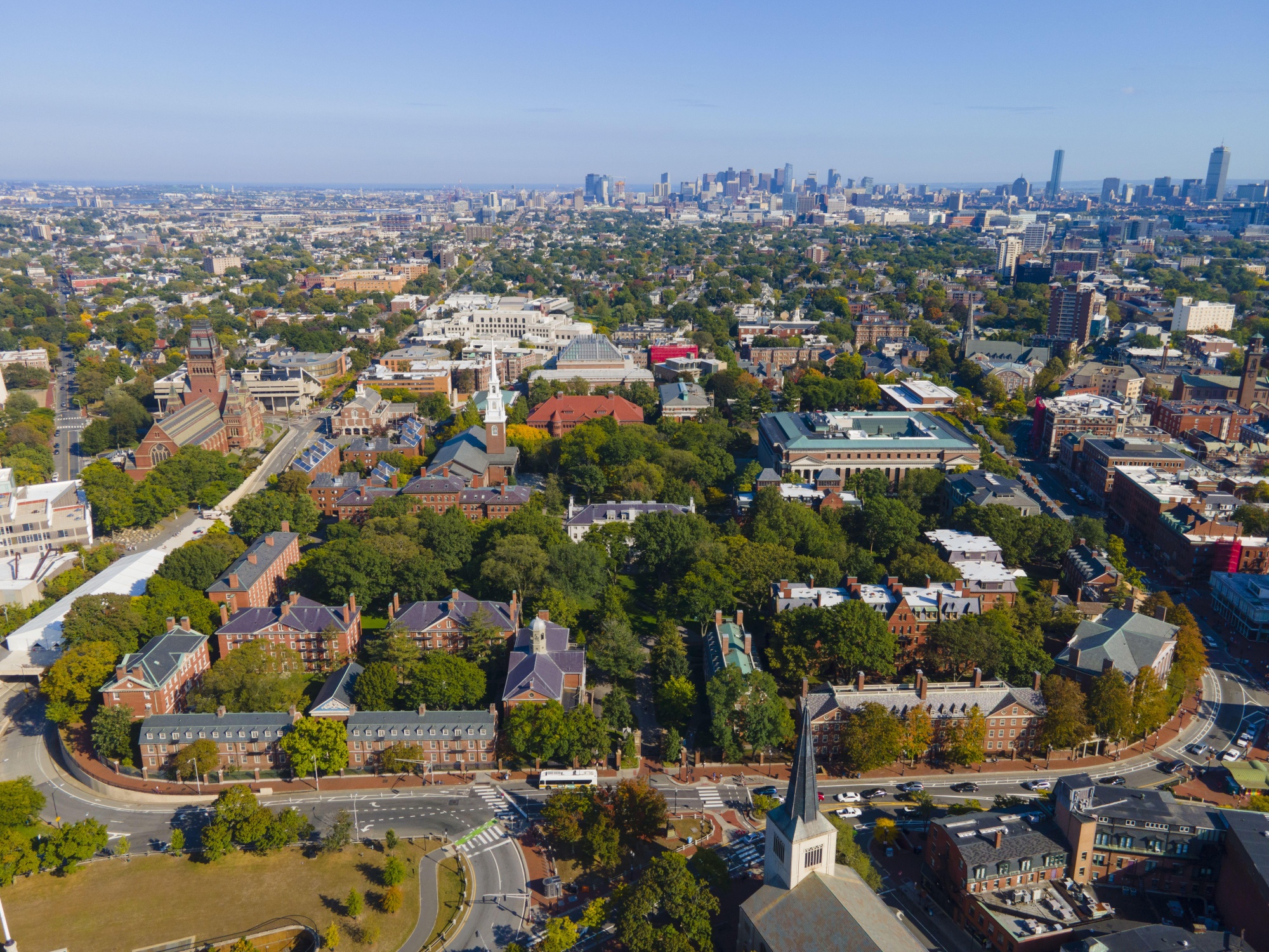 ▲ An aerial view of Harvard Yard in Cambridge, Massachusetts, with Boston across the Charles River. Photographer: Wangkun Jia / Alamy