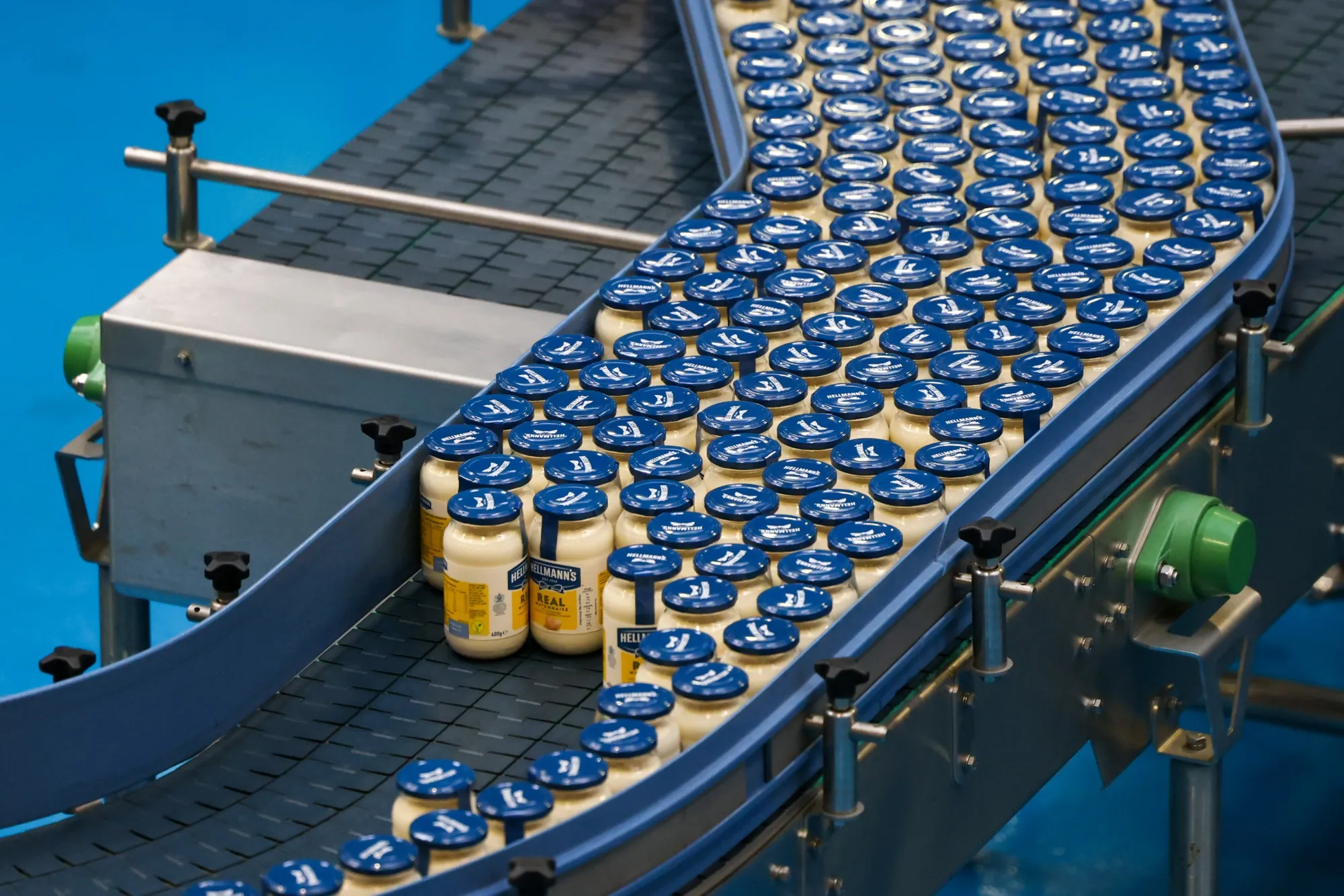 Jars of Hellmann’s Real Mayonnaise on the packaging line inside a Unilever factory in Burton upon Trent, UK.