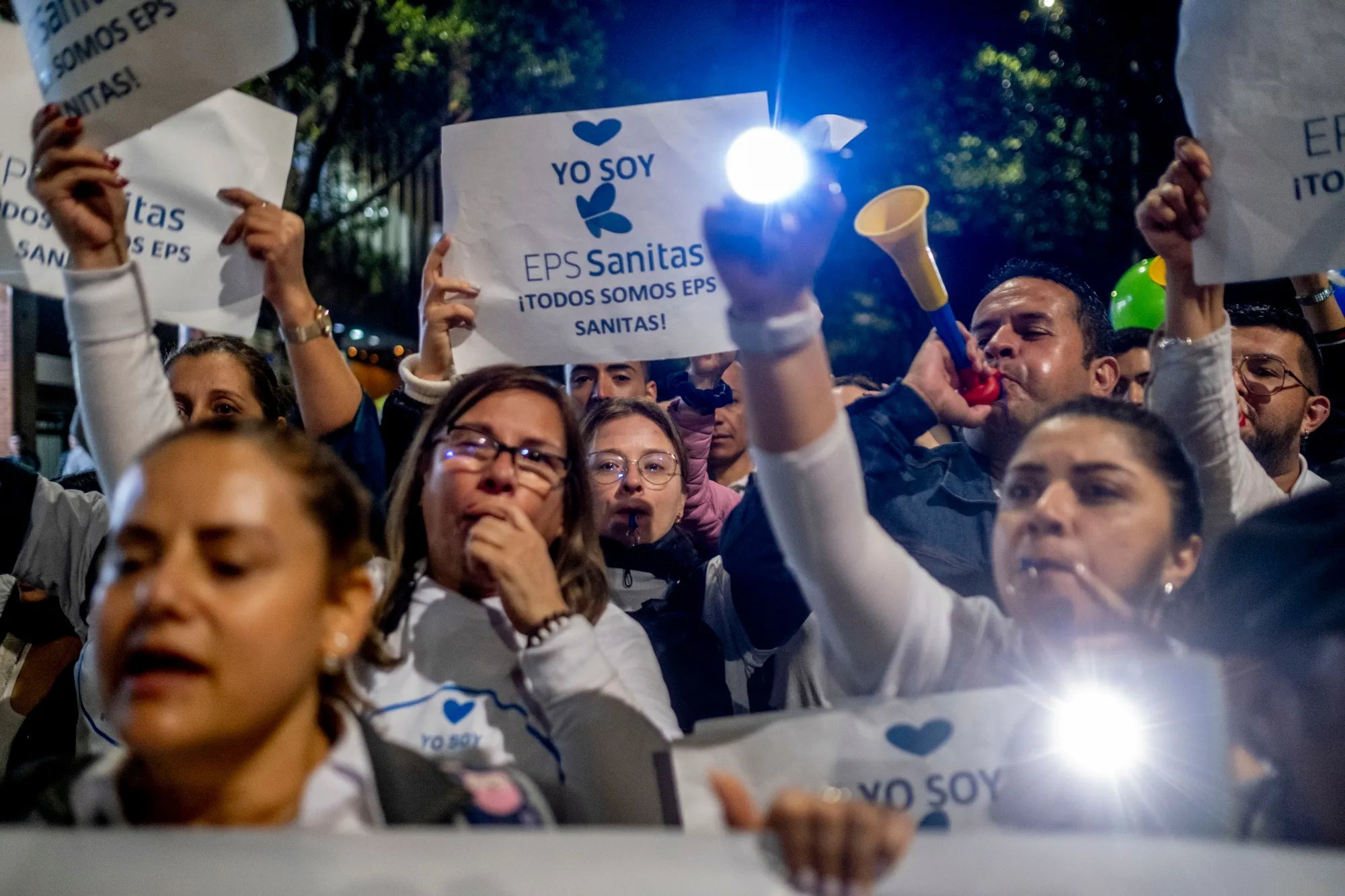 Private health insurance workers protest the government's proposed health care reform plan in Bogota.