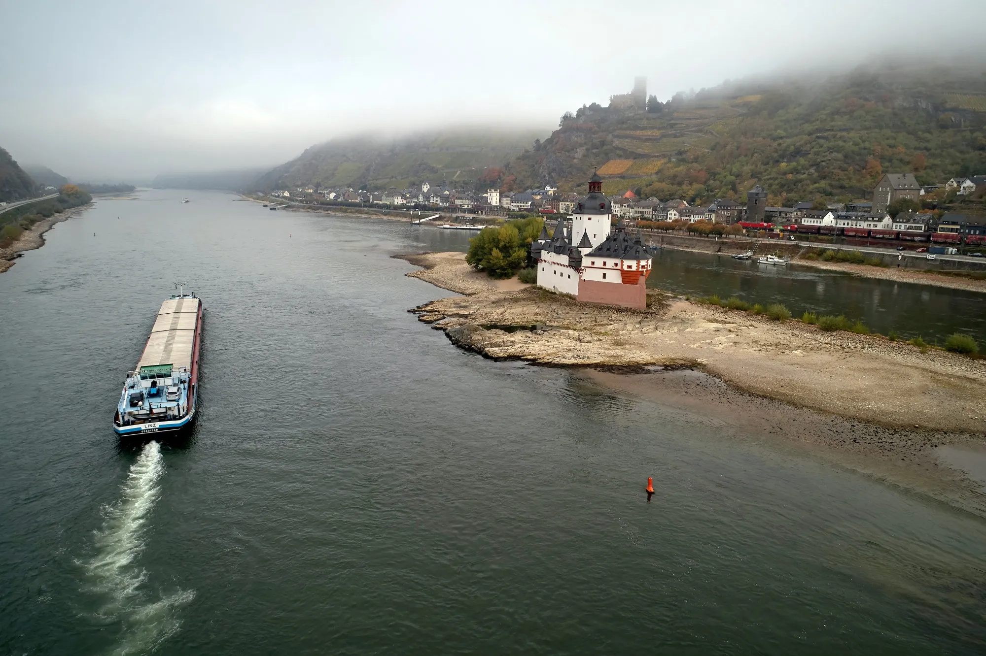A barge navigates the Rhine in Kaub, on Oct. 17, 2018.