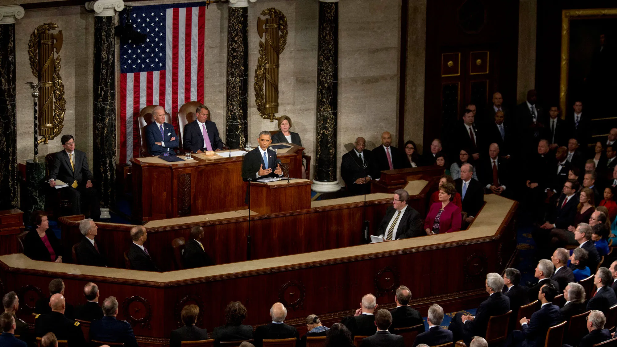 U.S. President Barack Obama, center, delivers the State of the Union address to a joint session of Congress at the Capitol in Washington, D.C., U.S., on Tuesday, Jan. 20, 2015.
