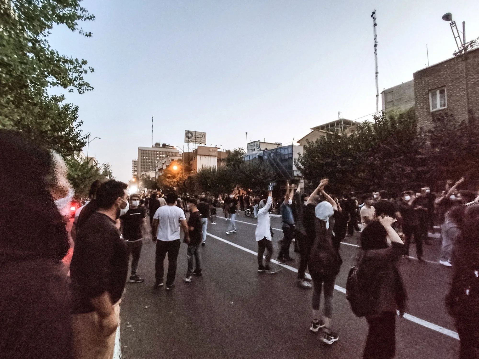 Women take to the streets of Tehran on Sept. 21.