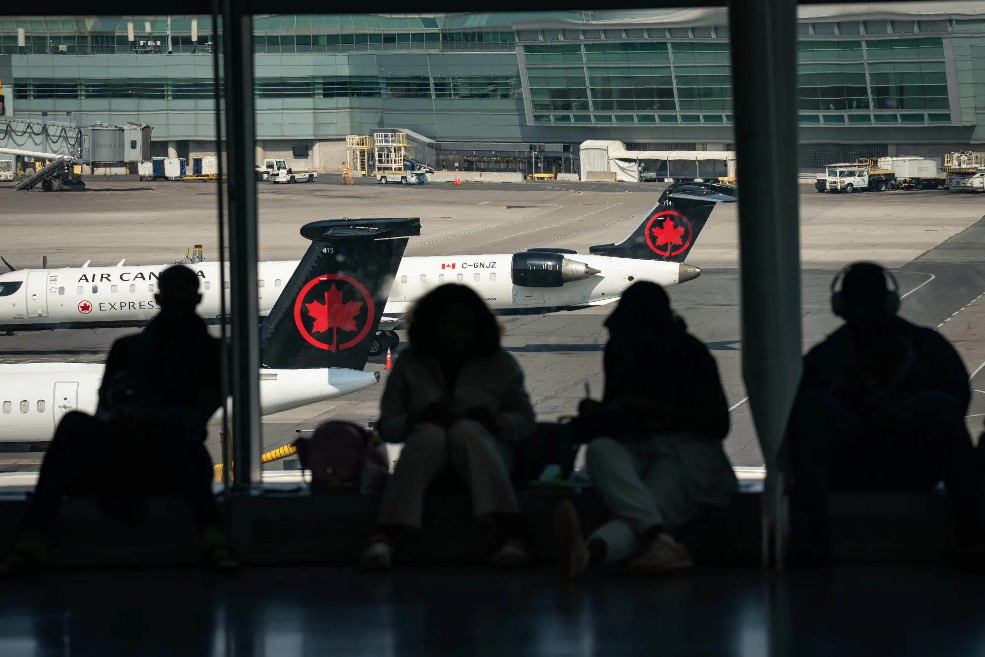 Passengers wait at Toronto Pearson International Airport in Mississauga, Ontario, Canada.