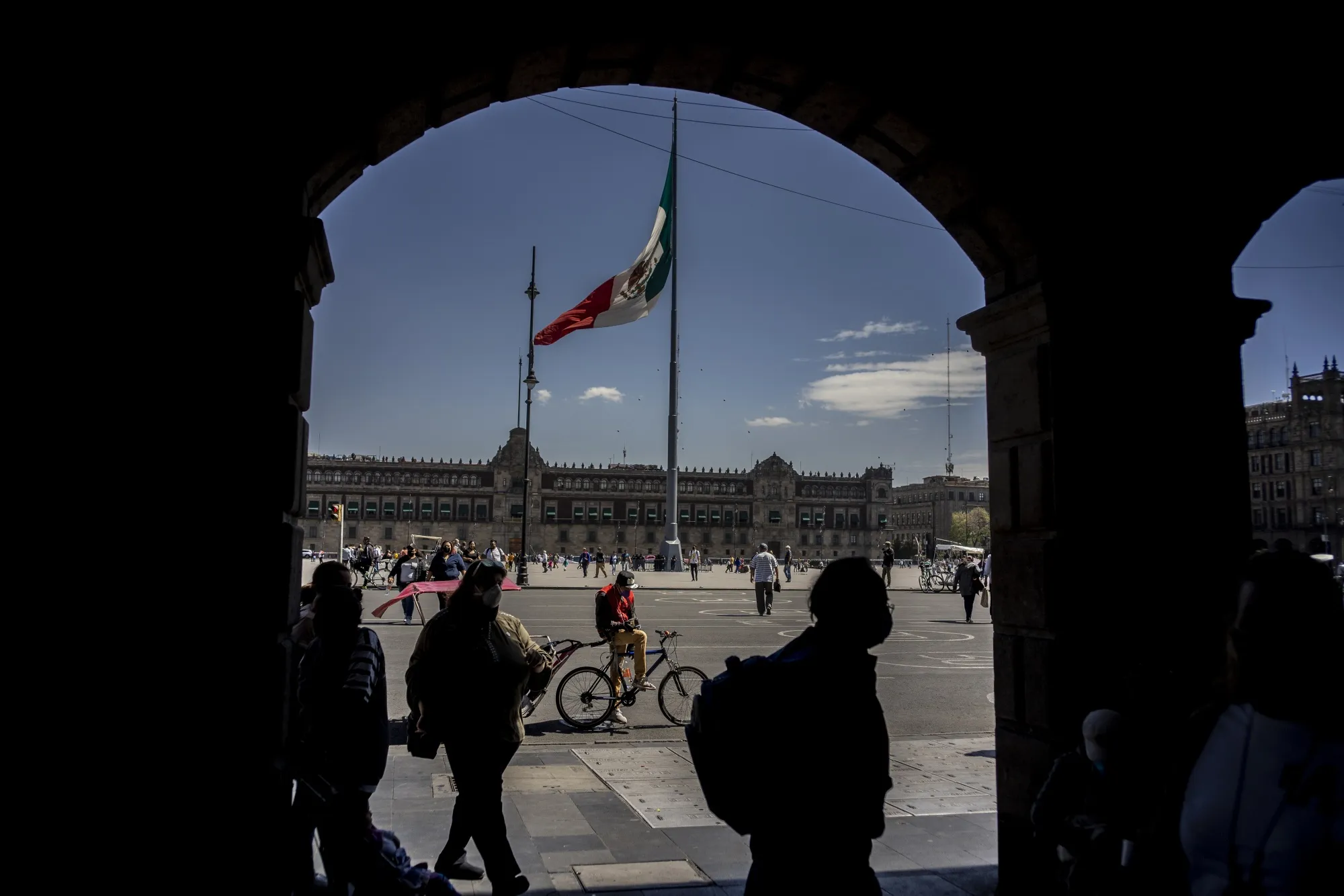 A Mexican flag flies at Constitution Square&nbsp;in Mexico City, Mexico.
