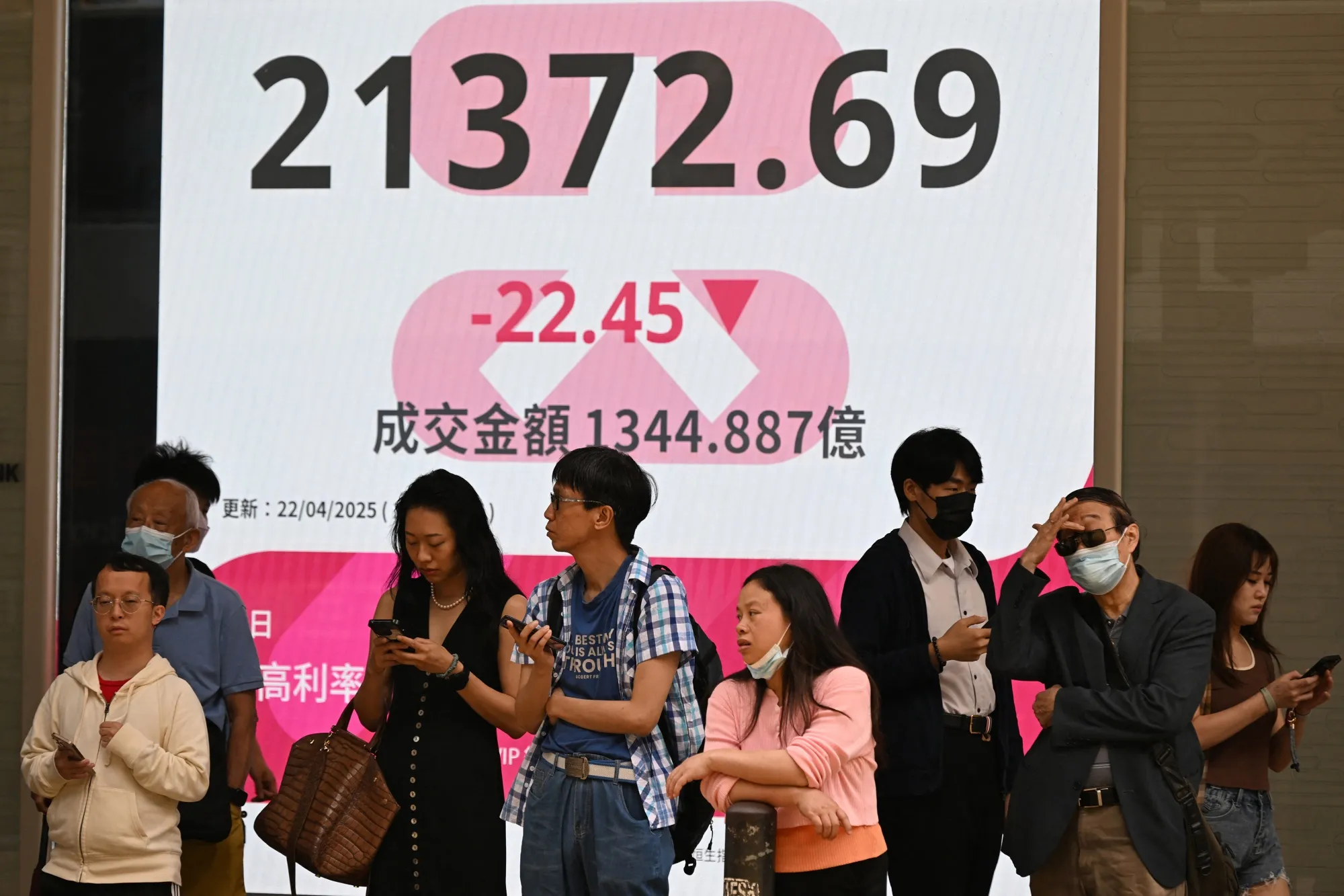 An electronic sign showing the Heng Seng Index in Hong Kong, on April 22.
