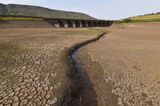 Remains Of Submerged Village Revealed Due To Low Water Levels At Ladybower Reservoir