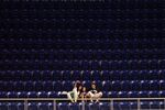 A family sits in an empty section at Marlins Park in Miami, on Ap&#13;
13, 2013&#13;
