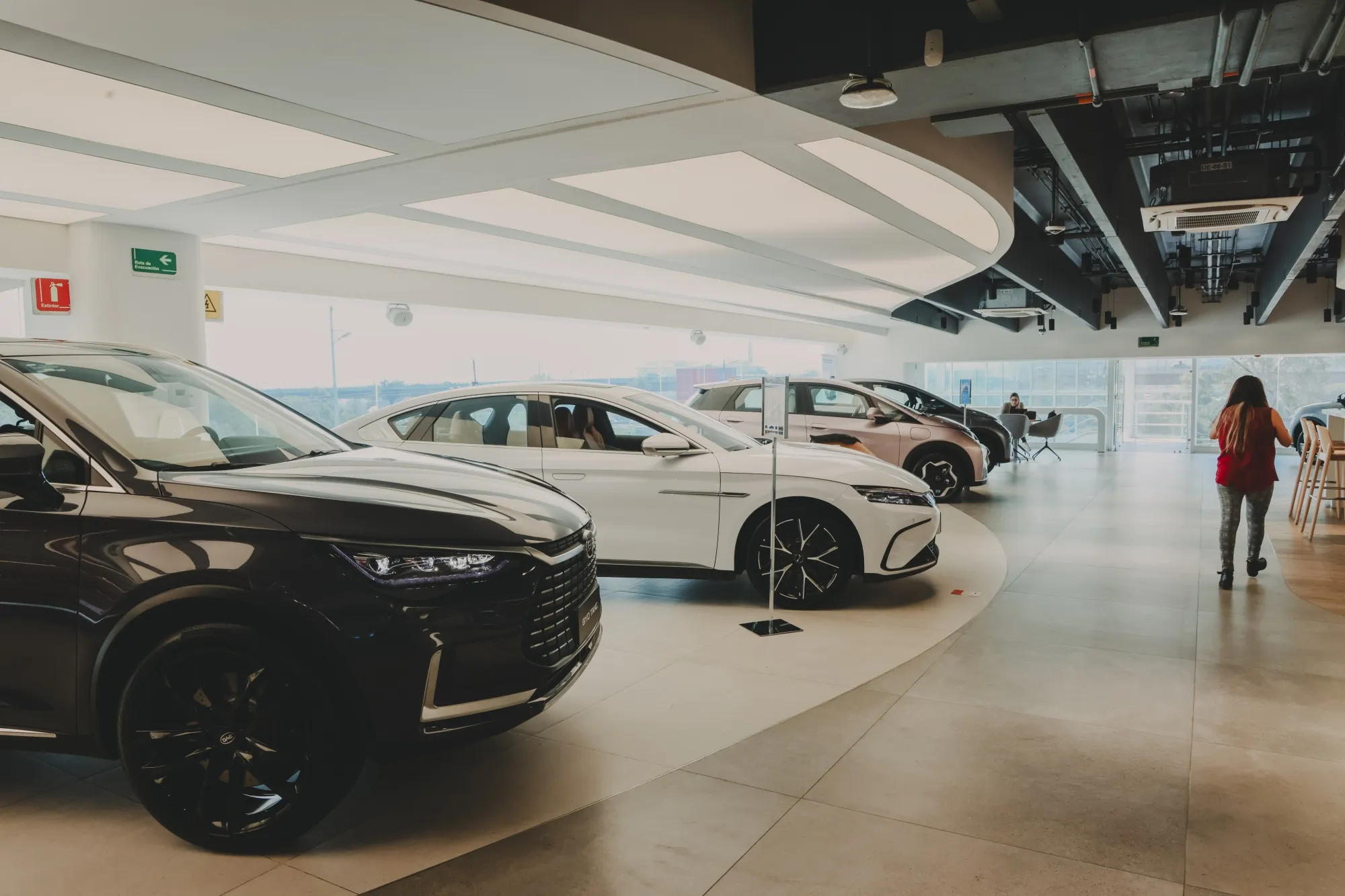 BYD electric vehicles at showroom in Mexico City.