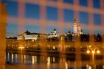The buildings of the Kremlin complex sit beside the Moskva River in Moscow, Russia.