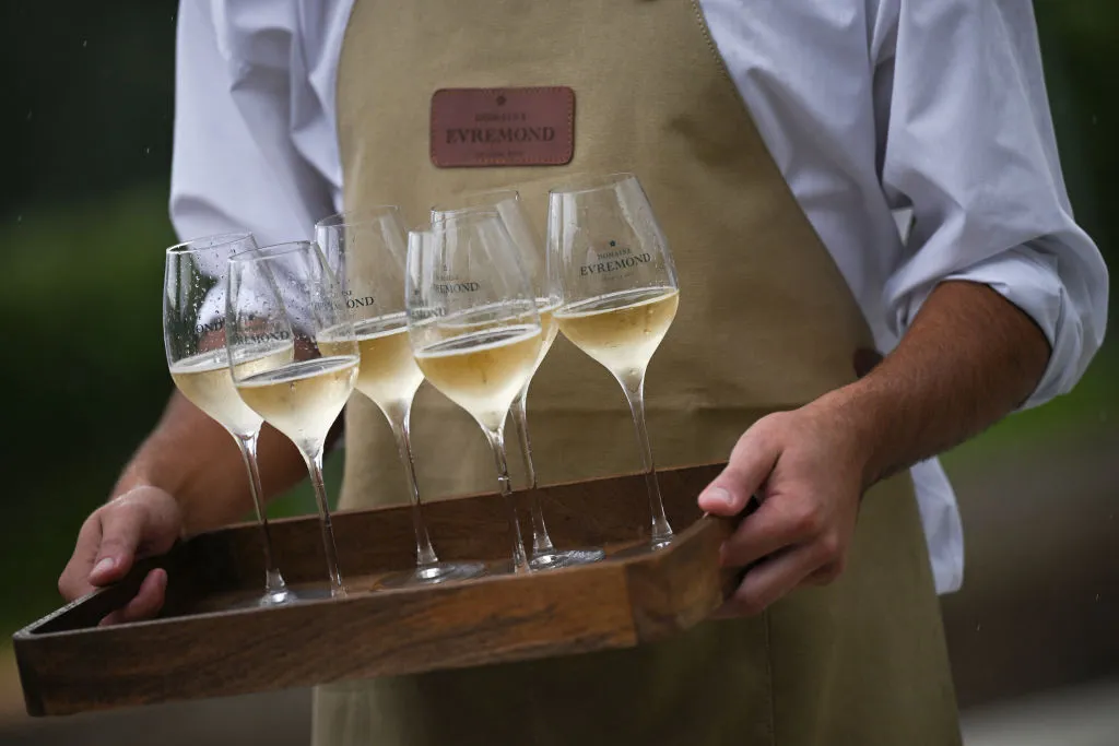 The first batch of wine at&nbsp;the official opening of France’s Taittinger vineyard&nbsp;in southeast England, in September 2024.