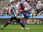 Crystal Palace striker Wilfried Zaha shoots at goal during the Premier League match between Newcastle United and Crystal Palace at St. James Park on Sept. 3.