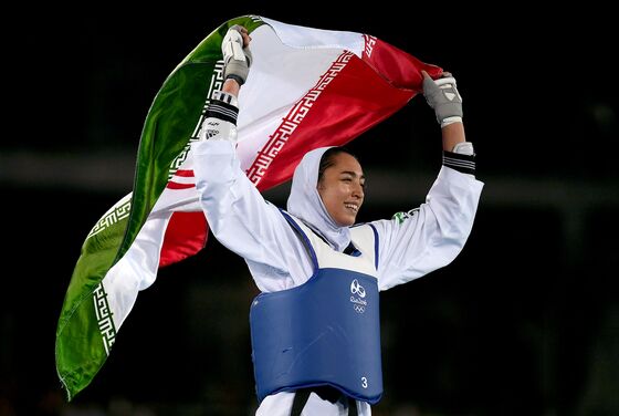 Sole Iranian Woman to Win Olympic Medal Defects - and Lashes Out