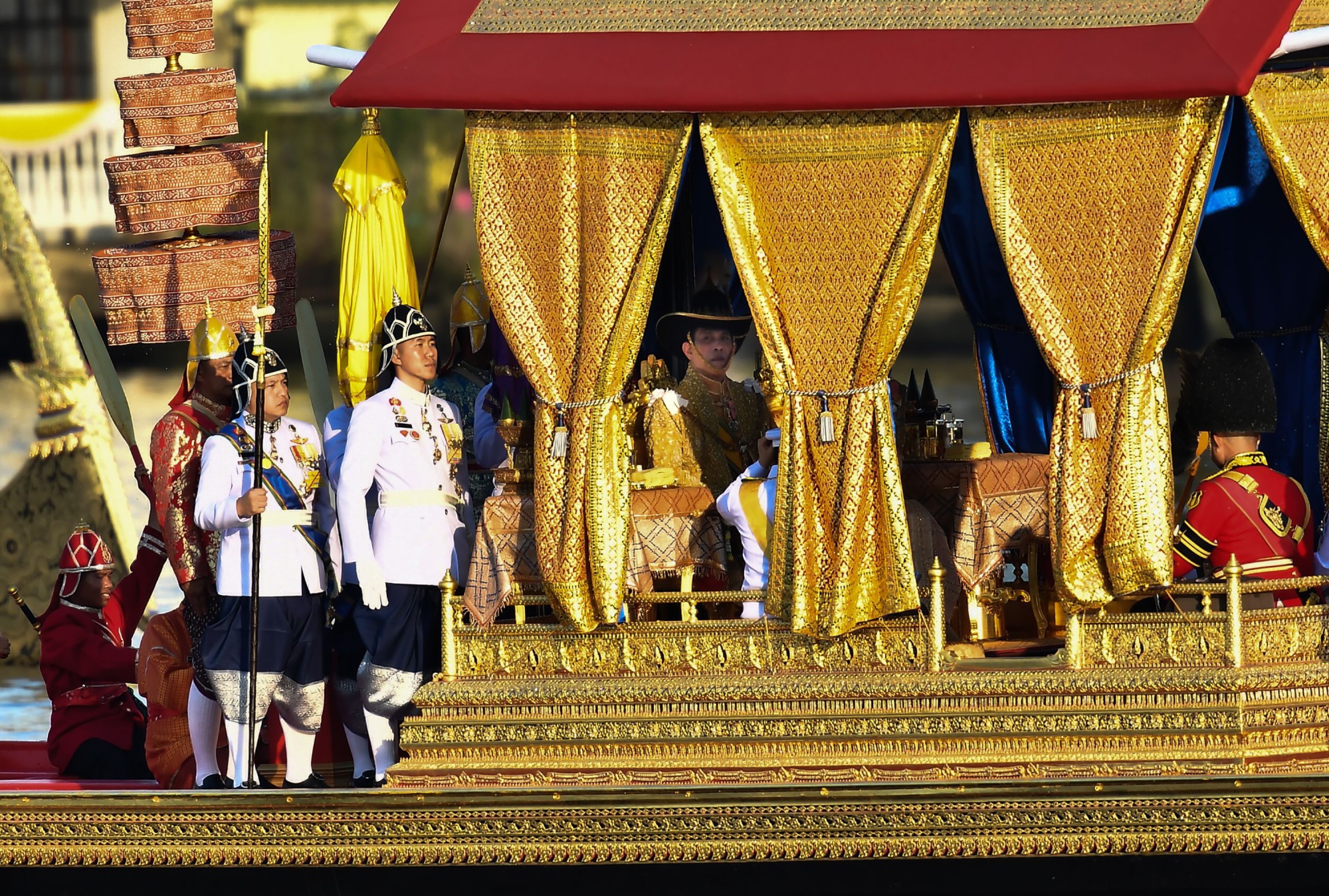King Maha Vajiralongkorn sits on his royal barge during the royal barge procession&nbsp;in Bangkok on Dec. 12.