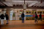 Commuters wait to board a New Jersey Transit train at Secaucus Junction station in New Jersey.