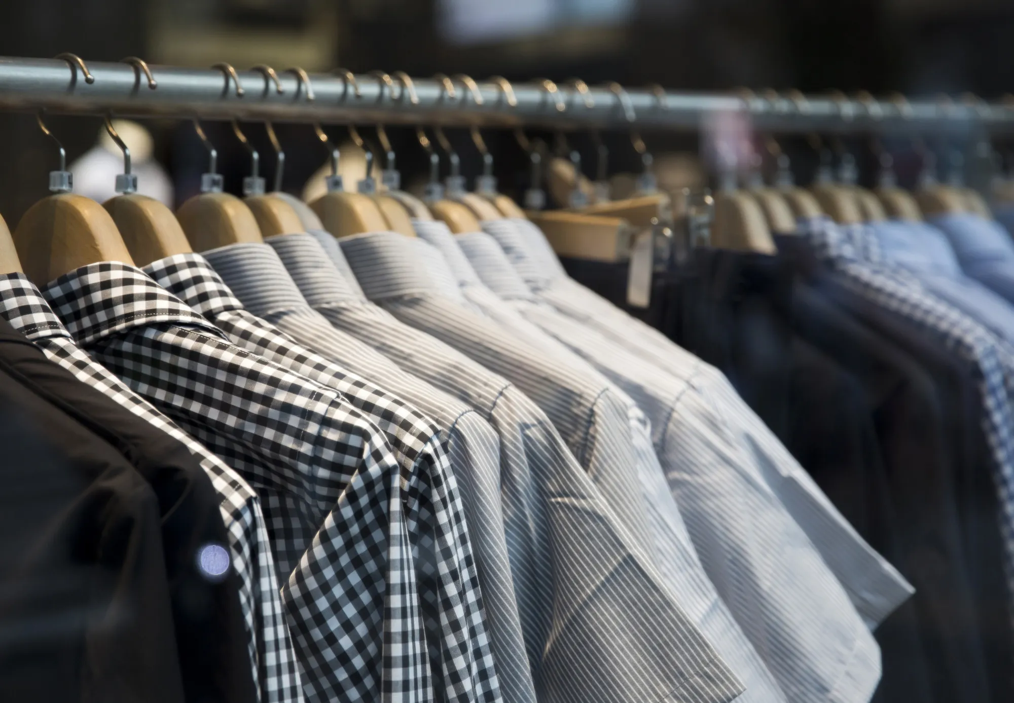 Shirts are displayed for sale.