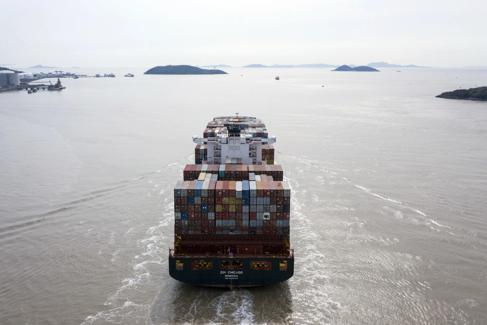 A container ship sails out of the Yangshan Deepwater Port&nbsp;in Shanghai.