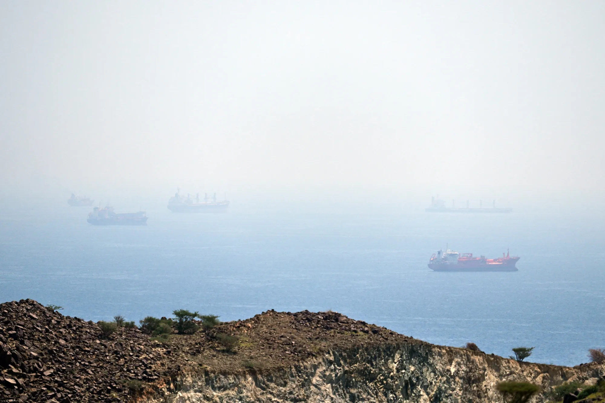 Tankers and bulk carriers anchored in the Strait of Hormuz, Saturday, April 18.