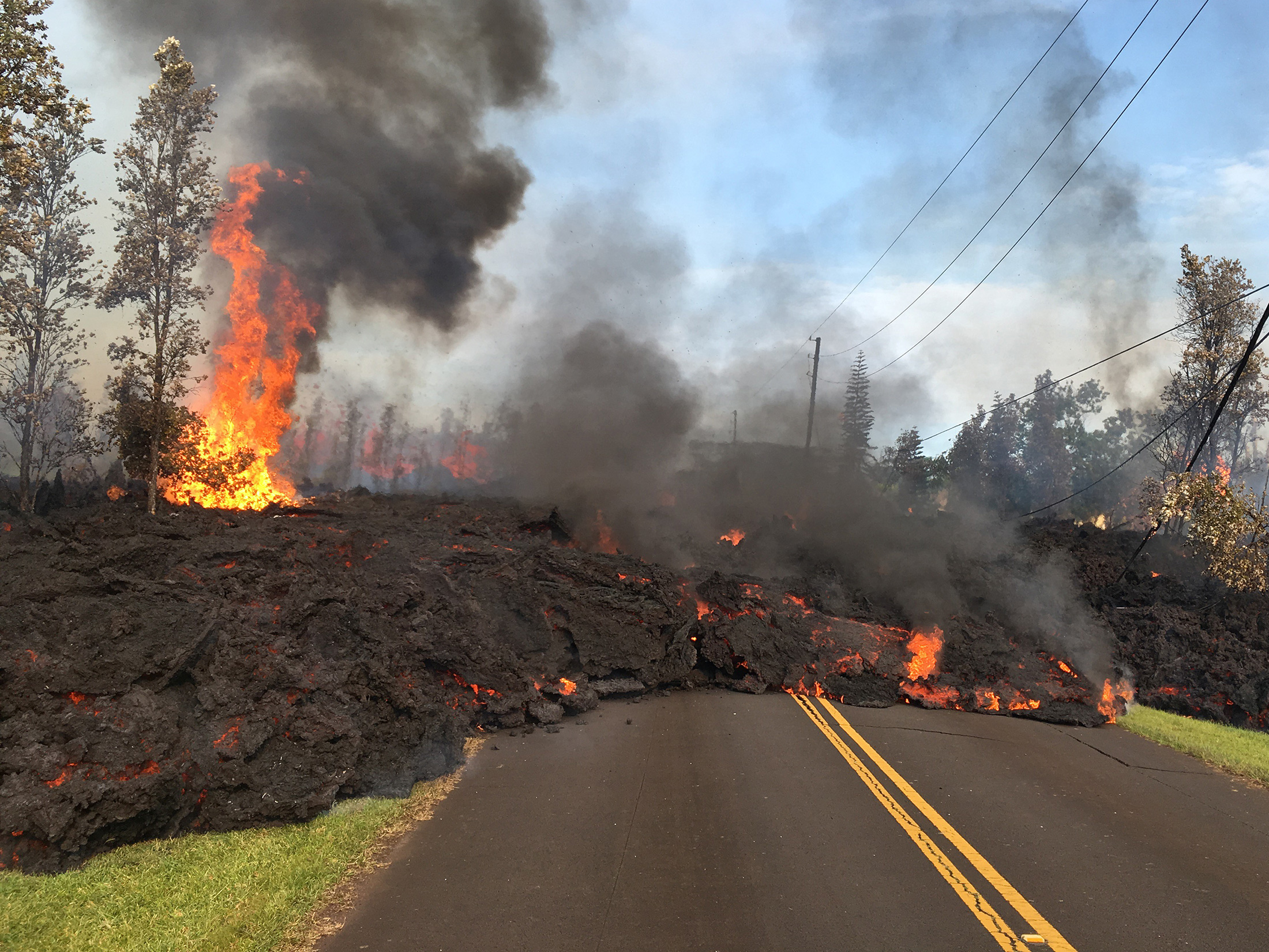 The Latest: 2 New Lava Vents Open Up In Hawaii Neighborhood - Bloomberg