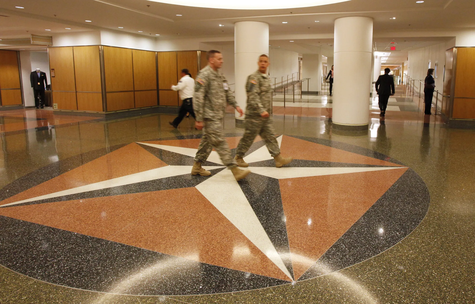 People walk through a corridor at the Pentagon in Arlington, Virginia.
