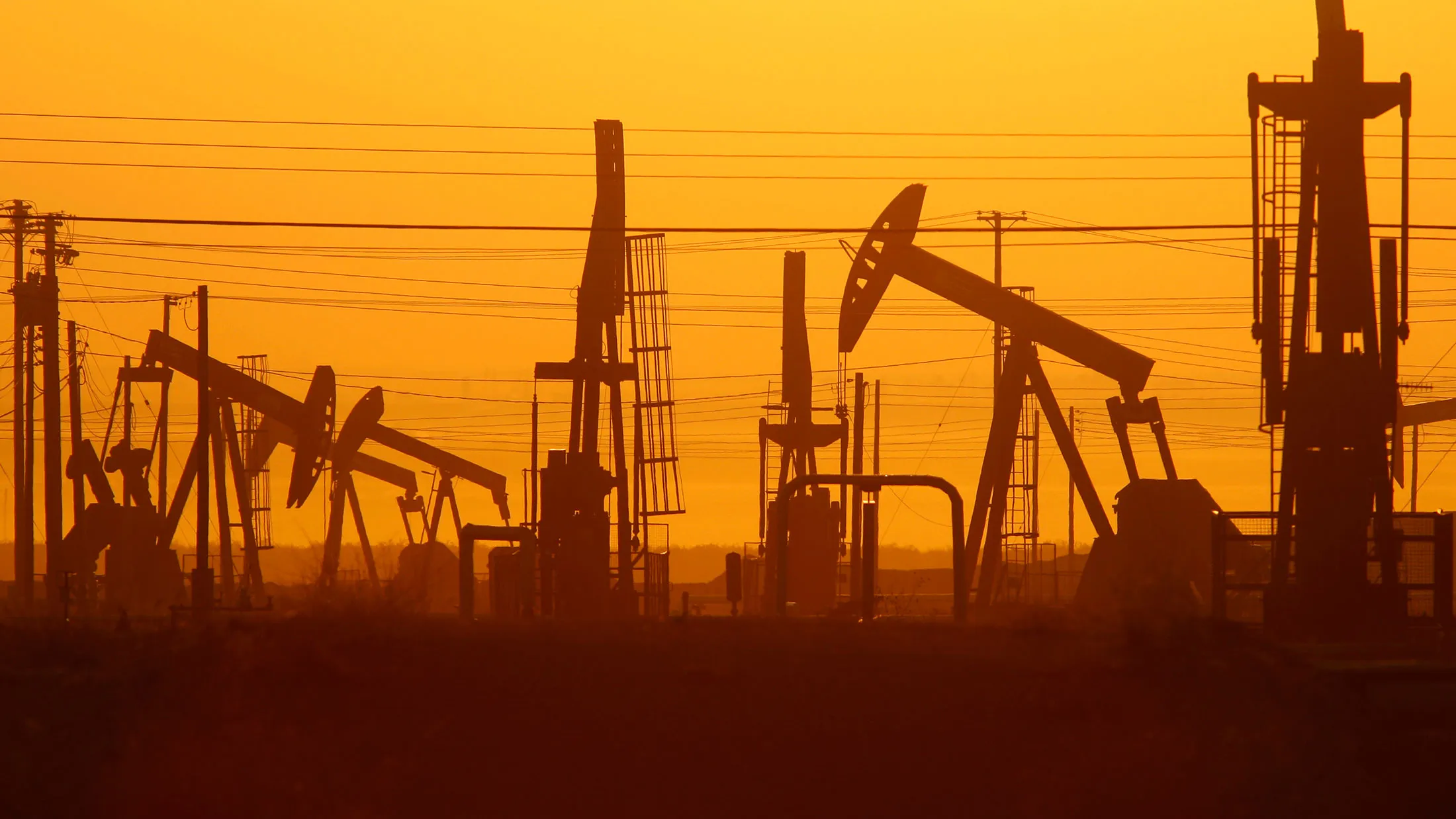 Pump jacks at an oil field over the Monterey Shale formation near Lost Hills, California.
