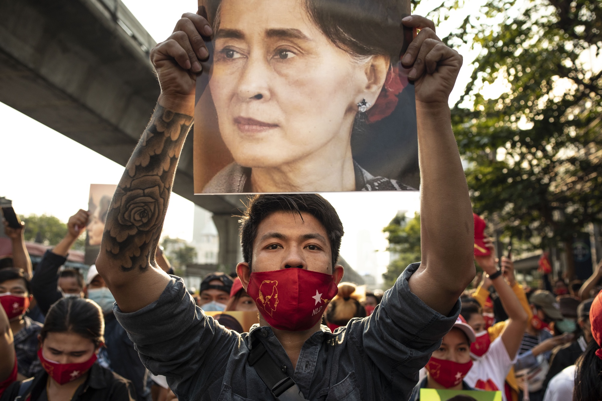 People demonstrate outside the Myanmar embassy in Bangkok on Feb. 1.