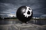 The Bitcoin symbol painted on a stone sphere monument&nbsp;in Oktyabrskaya Square in&nbsp;Yekaterinburg, Russia.&nbsp;