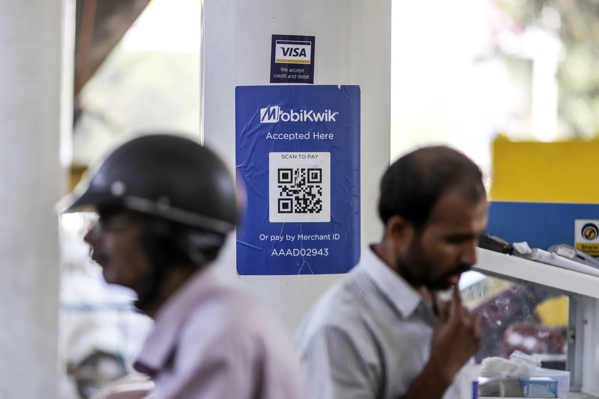 A MobiKwik branded QR code at a gas station in Bengaluru, India.