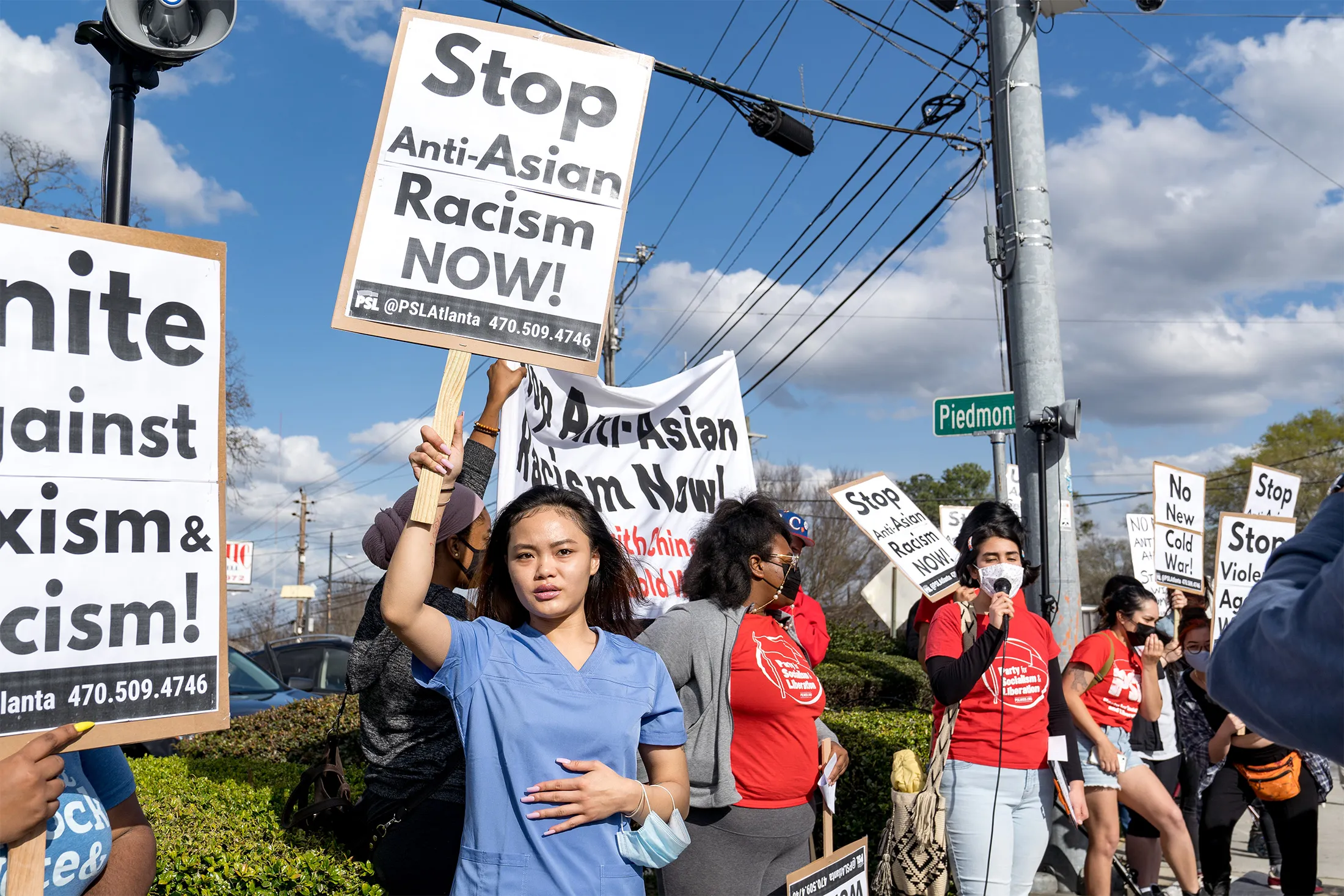 ATLANTA, GA - MARCH 18: Kitana Truong (C) and other activists demonstrate following Tuesday night's shooting on March 18, 2021 in Atlanta, Georgia. Suspect Robert Aaron Long, 21, was arrested after a series of shootings at three Atlanta-area spas left eight people dead, including six Asian women. (Photo by Megan Varner/Getty Images)