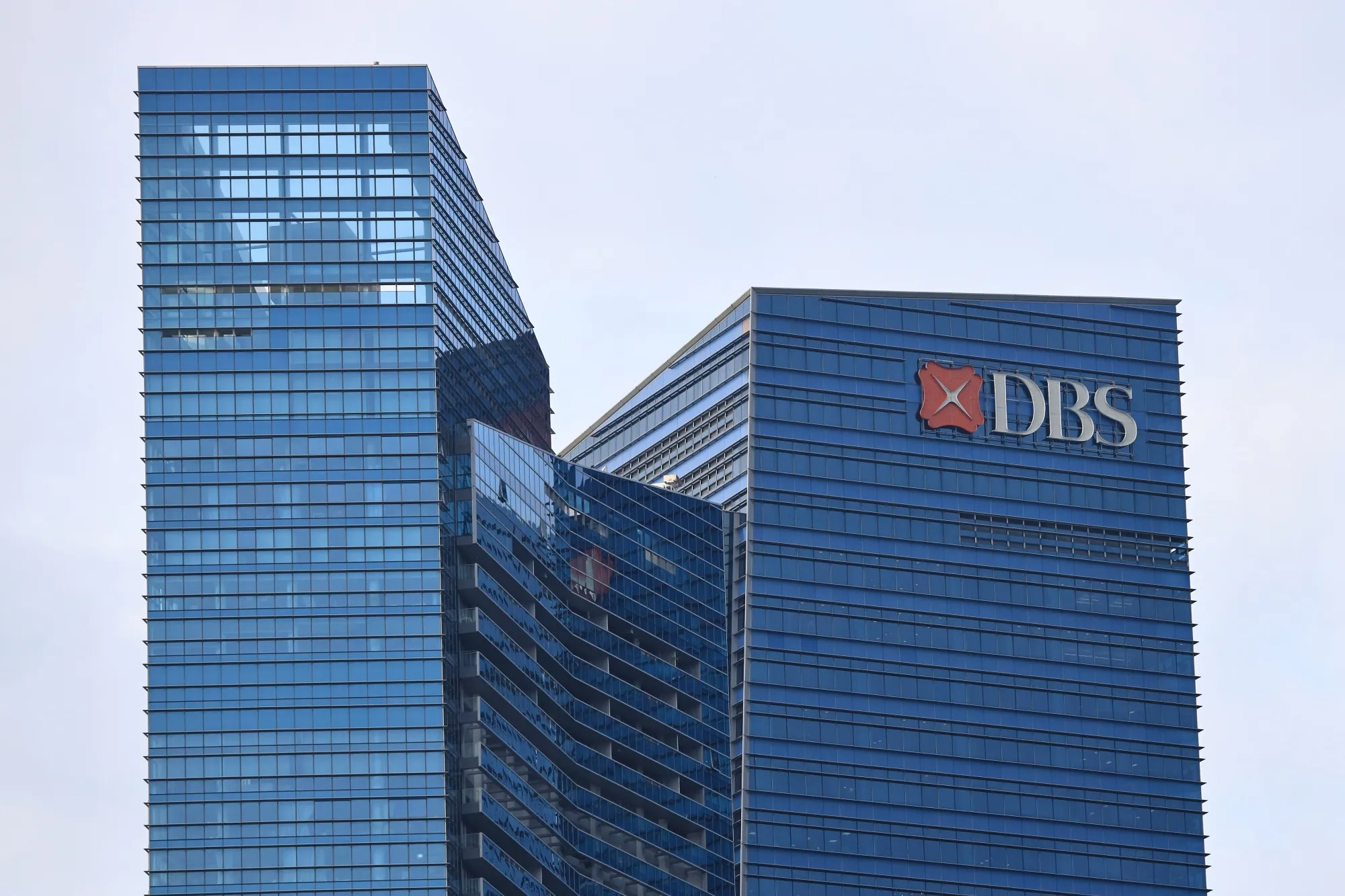 Shares of DBS opened lower Thursday morning, against a rise in the country’s benchmark stock index.&nbsp;