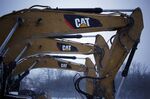 Caterpillar&nbsp;300-series excavator arms at a supply company yard&nbsp;in Lexington, Kentucky.