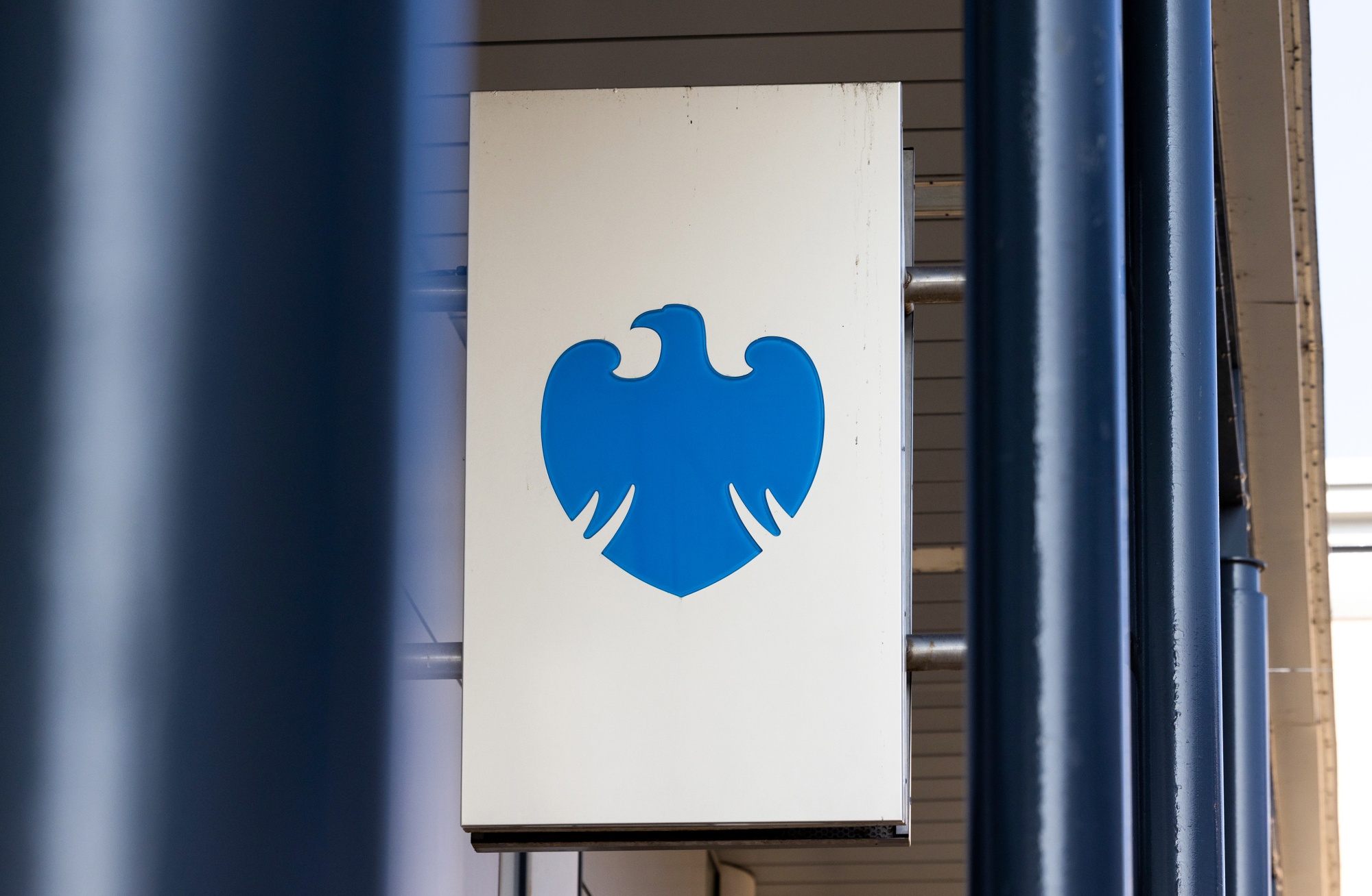 A sign above the entrance to a Barclays Plc bank branch in Harlow, UK.
