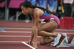Allyson Felix, of the United States, prepares to start in a semifinal of the women's 400 meters at the 2020 Summer Olympics, Aug. 4, 2021, in Tokyo. Felix was named to her 10th world championships team, where she will have a chance to run in the mixed relay event and add to her record medal collection. Felix, whose 18 medals are the most in world-championship history, has announced that this will be her final season in track. (AP Photo/Matthias Schrader, File)