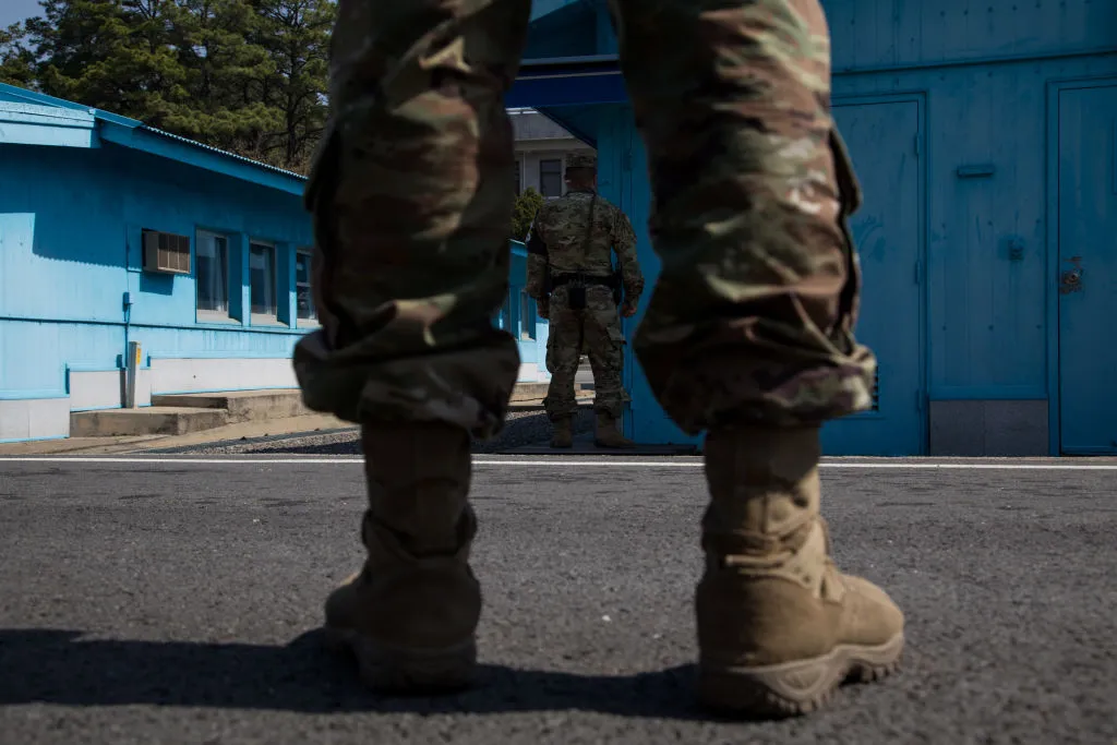 U.S. soldiers stand guard next to the United Nations Command Military Armistice Commission (UNCMAC) conference buildings at the truce village of Panmunjom in the Demilitarized Zone (DMZ) in Paju, South Korea.
